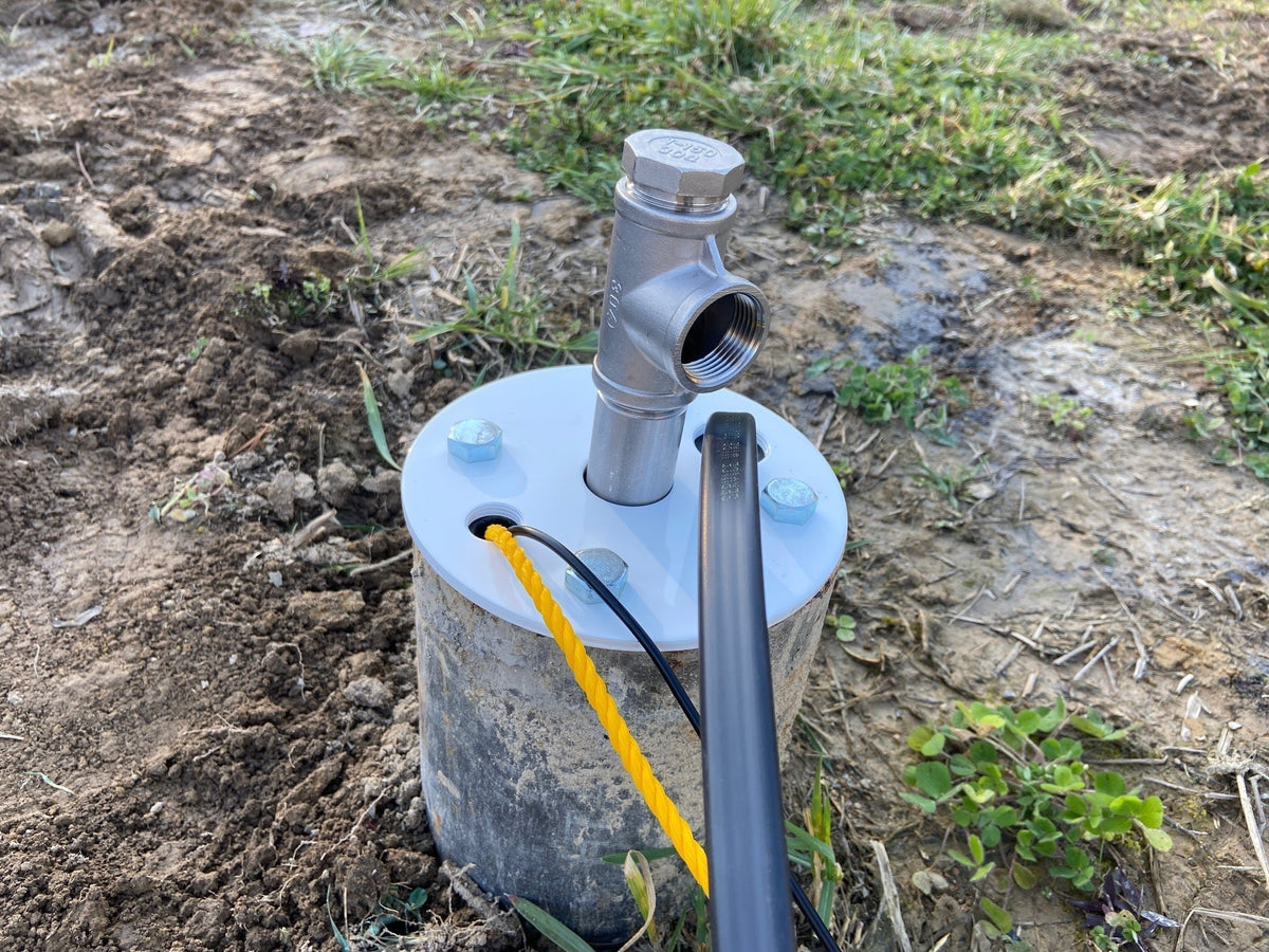 submersible well pump installation top view with wiring visible