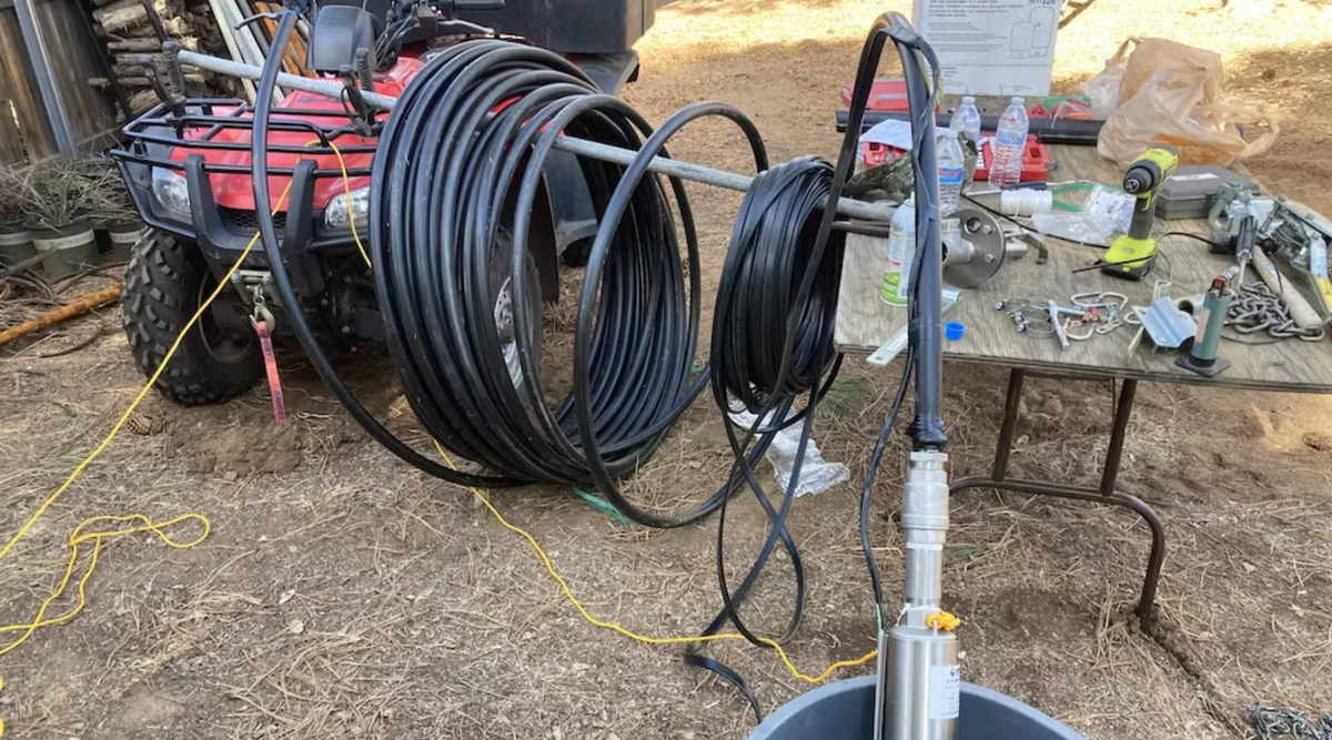 Coiled cables with submersible pump setup