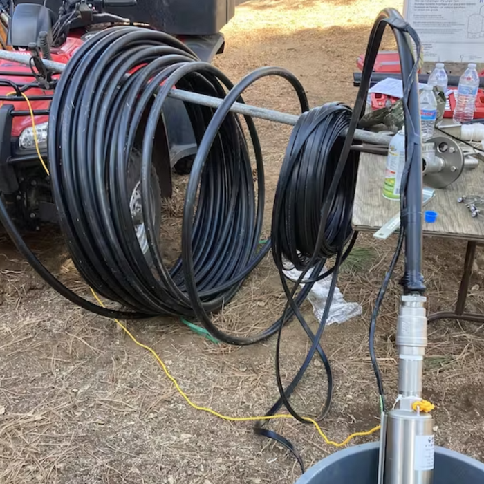Coiled cables with submersible pump setup